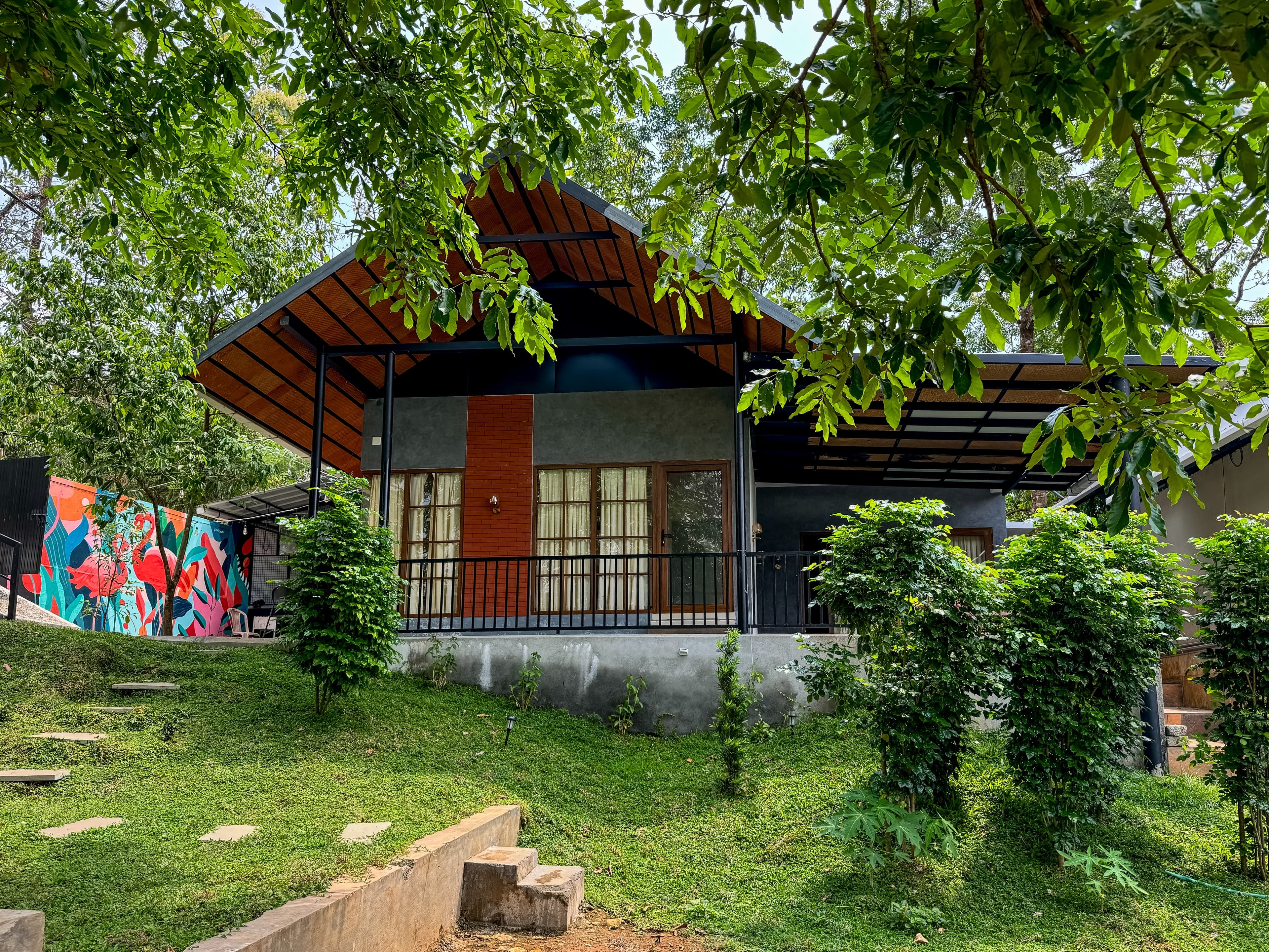 Thanal Villa – tropical pool deck at dusk